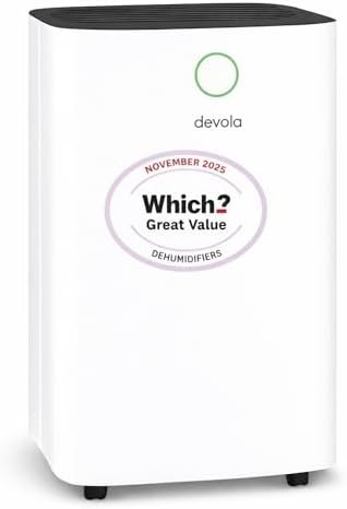 The Devola 12L dehumidifier standing in a modern living room showing its compact white design and digital control panel.