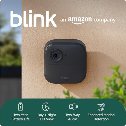 The front view of a black Blink Outdoor 4 camera showing its sleek square design and central lens.